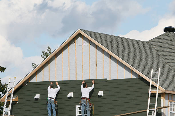 Professional Siding technician working in Sanford, NC